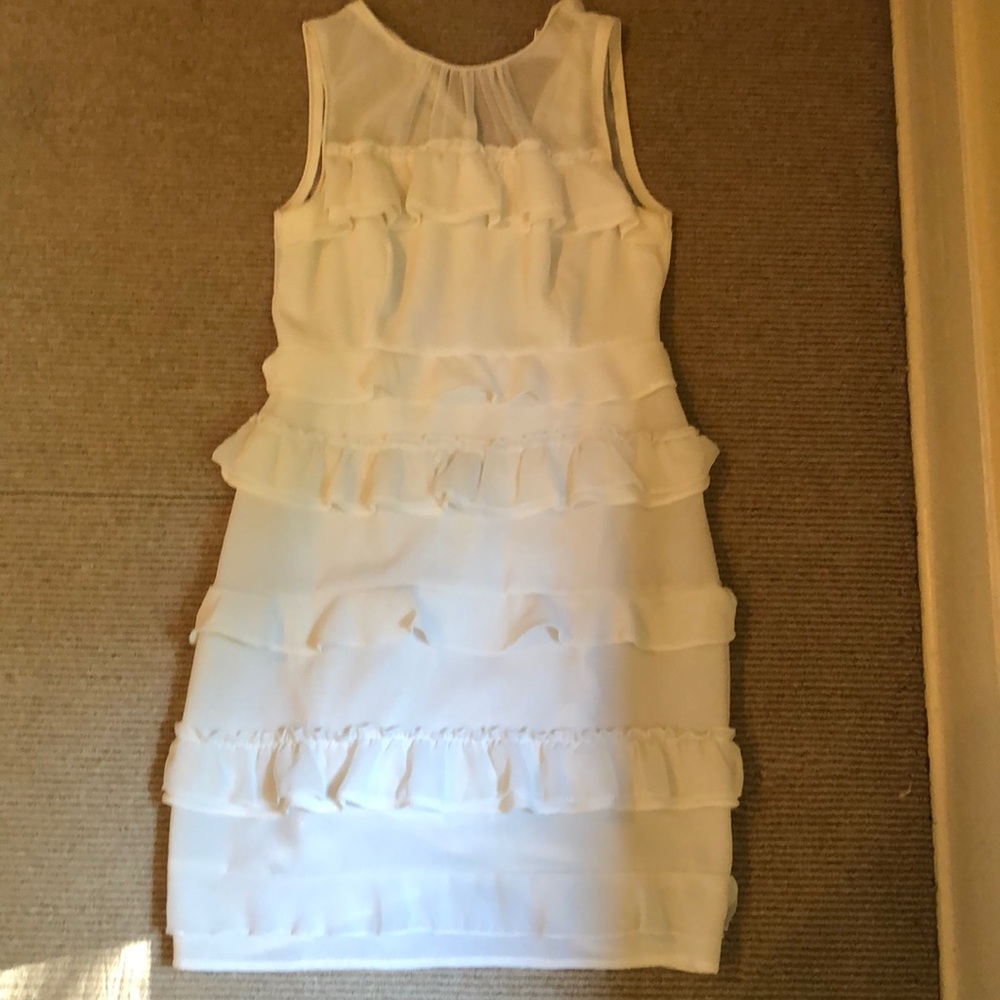 Esley white sundress with layered mesh ruffles.